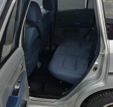 Сірий Мазда 2, об'ємом двигуна 1.4 л та пробігом 226 тис. км за 4350 $, фото 23 на Automoto.ua