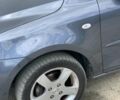 Серый Мазда 2, объемом двигателя 1.4 л и пробегом 180 тыс. км за 3900 $, фото 10 на Automoto.ua