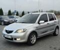 Сірий Мазда 2, об'ємом двигуна 1.4 л та пробігом 226 тис. км за 4350 $, фото 1 на Automoto.ua