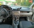 Серый Мазда 2, объемом двигателя 1.2 л и пробегом 267 тыс. км за 2000 $, фото 9 на Automoto.ua