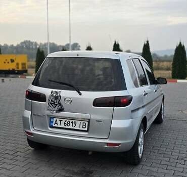 Сірий Мазда 2, об'ємом двигуна 1.4 л та пробігом 226 тис. км за 4350 $, фото 10 на Automoto.ua