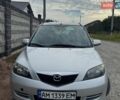 Сірий Мазда 2, об'ємом двигуна 1.4 л та пробігом 207 тис. км за 2999 $, фото 1 на Automoto.ua