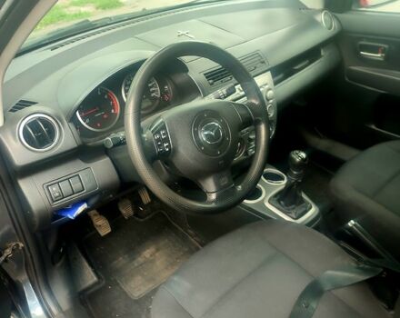 Серый Мазда 2, объемом двигателя 1.4 л и пробегом 220 тыс. км за 4300 $, фото 4 на Automoto.ua