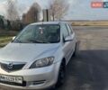 Сірий Мазда 2, об'ємом двигуна 1.4 л та пробігом 207 тис. км за 2999 $, фото 1 на Automoto.ua