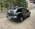 Сірий Мазда 2, об'ємом двигуна 1.6 л та пробігом 285 тис. км за 4700 $, фото 3 на Automoto.ua