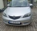 Серый Мазда 2, объемом двигателя 1.4 л и пробегом 190 тыс. км за 4400 $, фото 1 на Automoto.ua