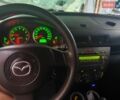 Серый Мазда 2, объемом двигателя 1.39 л и пробегом 290 тыс. км за 2999 $, фото 7 на Automoto.ua