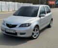 Серый Мазда 2, объемом двигателя 1.39 л и пробегом 177 тыс. км за 3850 $, фото 1 на Automoto.ua