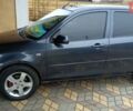 Сірий Мазда 2, об'ємом двигуна 1.4 л та пробігом 190 тис. км за 4850 $, фото 3 на Automoto.ua