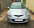 Серый Мазда 2, объемом двигателя 13 л и пробегом 147 тыс. км за 5200 $, фото 1 на Automoto.ua