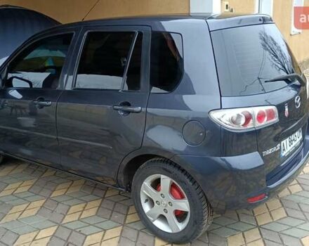 Серый Мазда 2, объемом двигателя 1.4 л и пробегом 190 тыс. км за 4850 $, фото 5 на Automoto.ua