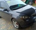 Сірий Мазда 2, об'ємом двигуна 1.4 л та пробігом 190 тис. км за 4850 $, фото 2 на Automoto.ua