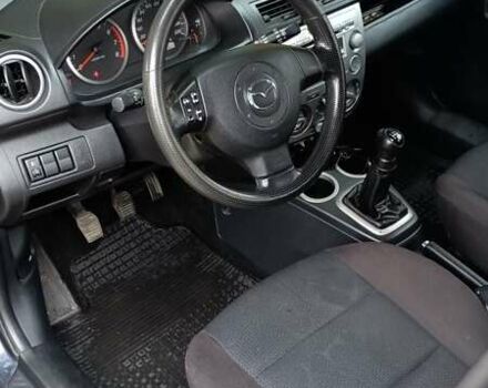 Серый Мазда 2, объемом двигателя 1.4 л и пробегом 190 тыс. км за 4850 $, фото 11 на Automoto.ua