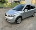 Серый Мазда 2, объемом двигателя 1.4 л и пробегом 268 тыс. км за 3214 $, фото 1 на Automoto.ua