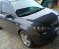 Серый Мазда 2, объемом двигателя 1.4 л и пробегом 190 тыс. км за 4850 $, фото 2 на Automoto.ua