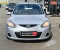Серый Мазда 2, объемом двигателя 1.3 л и пробегом 168 тыс. км за 4990 $, фото 1 на Automoto.ua