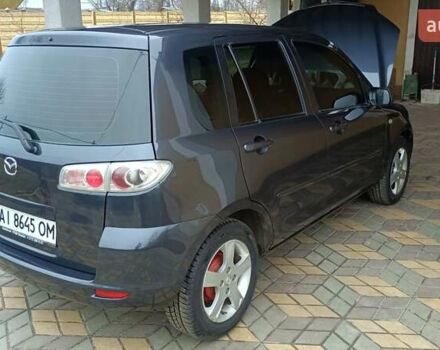 Серый Мазда 2, объемом двигателя 1.4 л и пробегом 190 тыс. км за 4850 $, фото 4 на Automoto.ua