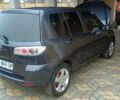 Сірий Мазда 2, об'ємом двигуна 1.4 л та пробігом 190 тис. км за 4850 $, фото 4 на Automoto.ua
