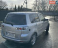 Сірий Мазда 2, об'ємом двигуна 1.39 л та пробігом 300 тис. км за 4100 $, фото 2 на Automoto.ua