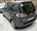 Сірий Мазда 2, об'ємом двигуна 1.4 л та пробігом 299 тис. км за 4150 $, фото 1 на Automoto.ua