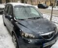 Сірий Мазда 2, об'ємом двигуна 1.4 л та пробігом 299 тис. км за 4150 $, фото 1 на Automoto.ua