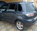 Сірий Мазда 2, об'ємом двигуна 1.4 л та пробігом 190 тис. км за 4850 $, фото 5 на Automoto.ua