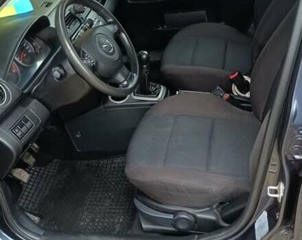 Серый Мазда 2, объемом двигателя 1.4 л и пробегом 190 тыс. км за 4850 $, фото 10 на Automoto.ua