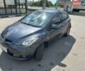 Серый Мазда 2, объемом двигателя 1.5 л и пробегом 97 тыс. км за 6200 $, фото 1 на Automoto.ua