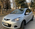 Серый Мазда 2, объемом двигателя 1.4 л и пробегом 205 тыс. км за 5300 $, фото 1 на Automoto.ua