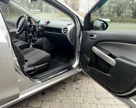 Серый Мазда 2, объемом двигателя 1.4 л и пробегом 249 тыс. км за 4700 $, фото 14 на Automoto.ua