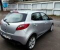 Сірий Мазда 2, об'ємом двигуна 1.4 л та пробігом 230 тис. км за 4800 $, фото 4 на Automoto.ua