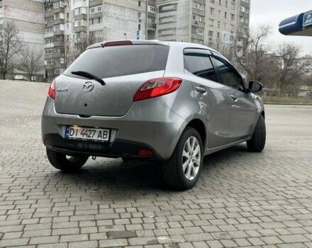 Серый Мазда 2, объемом двигателя 1.4 л и пробегом 249 тыс. км за 4700 $, фото 2 на Automoto.ua