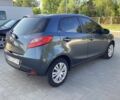 Сірий Мазда 2, об'ємом двигуна 1.4 л та пробігом 181 тис. км за 4200 $, фото 2 на Automoto.ua