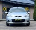 Серый Мазда 2, объемом двигателя 1.5 л и пробегом 179 тыс. км за 5205 $, фото 1 на Automoto.ua