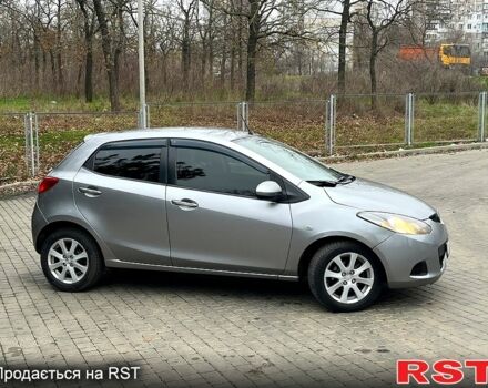 Сірий Мазда 2, об'ємом двигуна 1.4 л та пробігом 249 тис. км за 4700 $, фото 5 на Automoto.ua