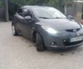 Серый Мазда 2, объемом двигателя 1.5 л и пробегом 117 тыс. км за 4600 $, фото 1 на Automoto.ua