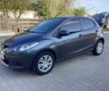 Серый Мазда 2, объемом двигателя 1.4 л и пробегом 181 тыс. км за 4200 $, фото 1 на Automoto.ua