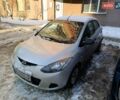 Серый Мазда 2, объемом двигателя 1.4 л и пробегом 240 тыс. км за 4299 $, фото 1 на Automoto.ua