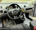 Серый Мазда 2, объемом двигателя 1.4 л и пробегом 150 тыс. км за 4400 $, фото 3 на Automoto.ua