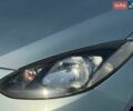 Сірий Мазда 2, об'ємом двигуна 1.4 л та пробігом 103 тис. км за 5699 $, фото 1 на Automoto.ua