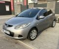 Серый Мазда 2, объемом двигателя 1.3 л и пробегом 200 тыс. км за 5000 $, фото 1 на Automoto.ua