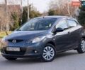 Серый Мазда 2, объемом двигателя 1.5 л и пробегом 159 тыс. км за 6800 $, фото 1 на Automoto.ua