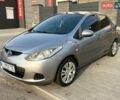 Серый Мазда 2, объемом двигателя 1.35 л и пробегом 195 тыс. км за 4800 $, фото 1 на Automoto.ua