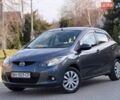 Серый Мазда 2, объемом двигателя 1.5 л и пробегом 159 тыс. км за 6800 $, фото 2 на Automoto.ua