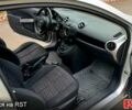 Серый Мазда 2, объемом двигателя 1.4 л и пробегом 150 тыс. км за 4400 $, фото 4 на Automoto.ua