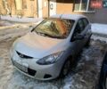 Серый Мазда 2, объемом двигателя 1.4 л и пробегом 240 тыс. км за 4299 $, фото 1 на Automoto.ua
