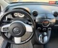 Серый Мазда 2, объемом двигателя 1.5 л и пробегом 159 тыс. км за 6800 $, фото 18 на Automoto.ua