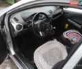 Серый Мазда 2, объемом двигателя 1.4 л и пробегом 150 тыс. км за 6000 $, фото 9 на Automoto.ua