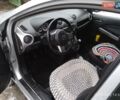 Серый Мазда 2, объемом двигателя 1.4 л и пробегом 150 тыс. км за 6000 $, фото 9 на Automoto.ua