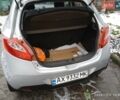 Серый Мазда 2, объемом двигателя 1.4 л и пробегом 150 тыс. км за 6000 $, фото 1 на Automoto.ua